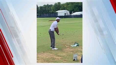 Tiger Woods warming up before a tournament.