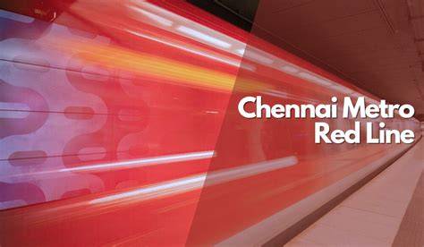 Inside a Chennai Metro Red Line train with passengers seated and standing.