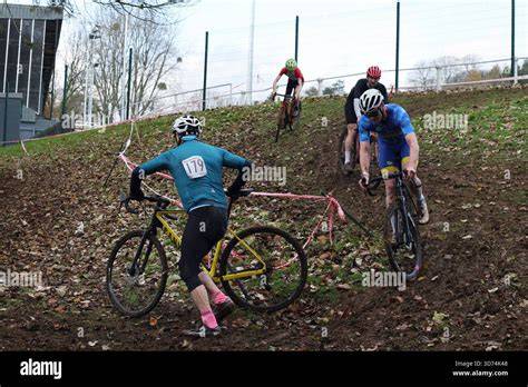 cyclo-cross competitors racing on a gravel course