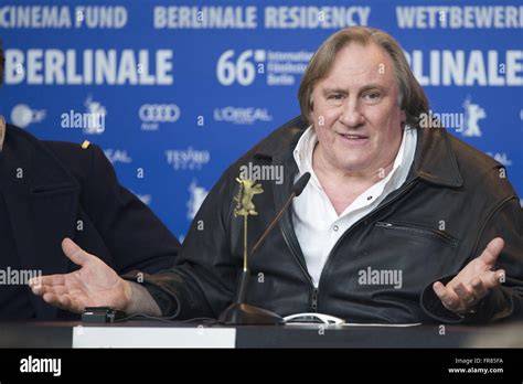 Gérard Depardieu addressing the media at a public event.