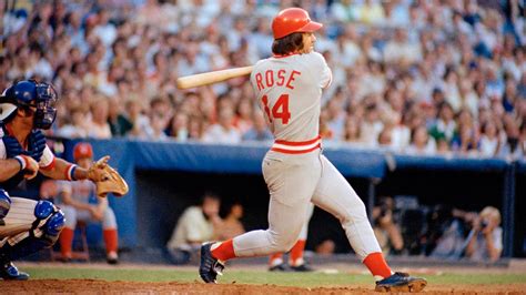 Pete Rose hitting the ball in a Major League Baseball game.