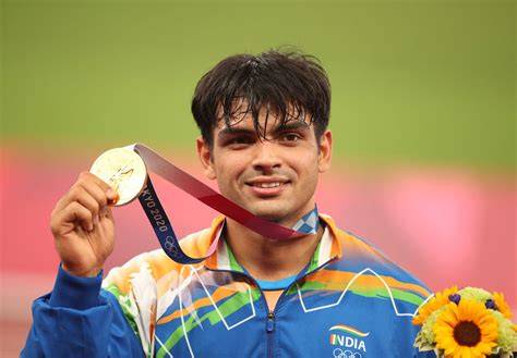 Neeraj Chopra on the podium receiving his gold medal at the 2018 Asian Games.