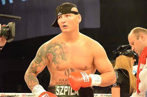 Artur Szpilka is focused and warming up before entering the boxing ring.