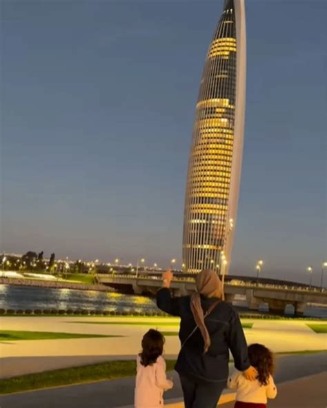 A vibrant cultural event taking place in front of the Mohammed VI Tower.