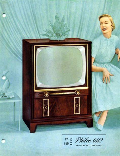 A collection of vintage television sets from the 1950s displaying black and white images.