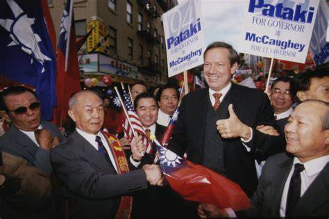 George Pataki celebrating his victory in the 1994 gubernatorial election with supporters.