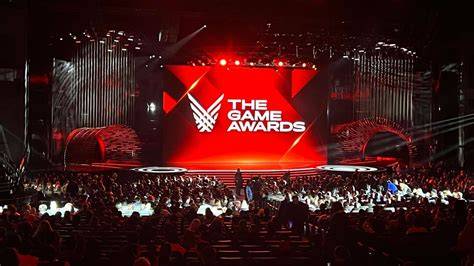 A person watching The Game Awards live on a computer screen with excitement.