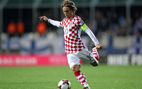 Luka Modrić in action playing for the Croatia national football team.