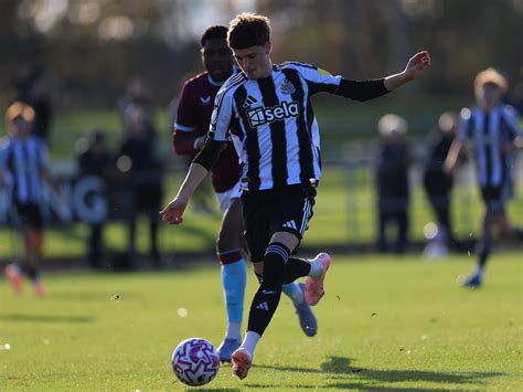 Newcastle United Under-21s team in action during a football match.