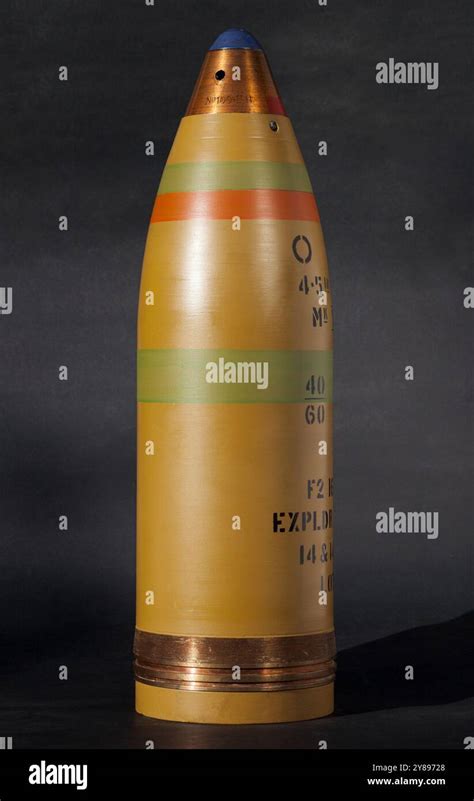 A close-up of Hudson Maxim's high-explosive artillery shell with detailed features visible.