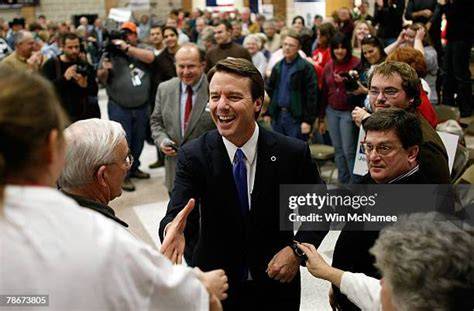 John Edwards engaging with voters at the Iowa caucus