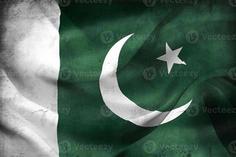 A vintage photograph capturing the moment of the flag of Pakistan's adoption in 1947.