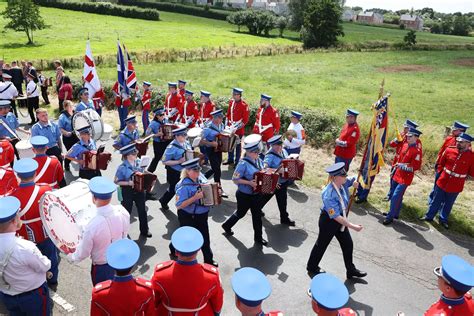 police presence during a Drumcree parade as tensions rise