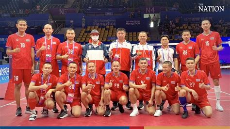 The Thai sepak takraw team celebrating after winning a match at the Asian Games.