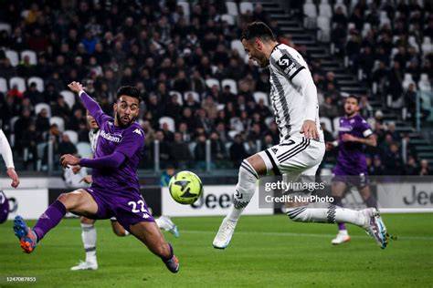 ACF Fiorentina players on the pitch during a match against Juventus.