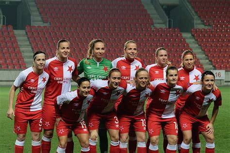 Players from Slavia Prague women's soccer team competing in a match.