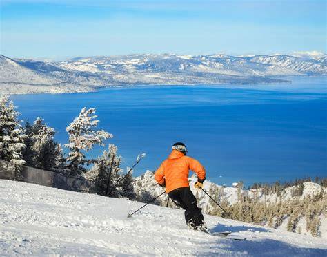 Skiers enjoying the slopes at a popular Lake Tahoe ski resort during winter.