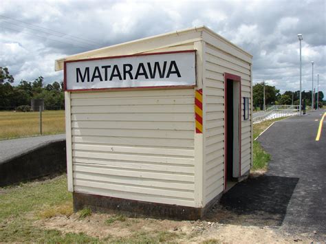Buses parked at the local bus stop adjacent to Matarawa railway station.