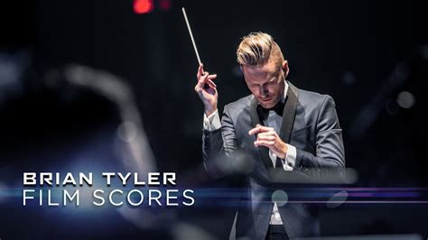 A composer showcasing his work at a live concert.